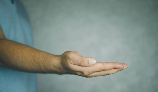 Open man hand showing something, close up - Photo, image