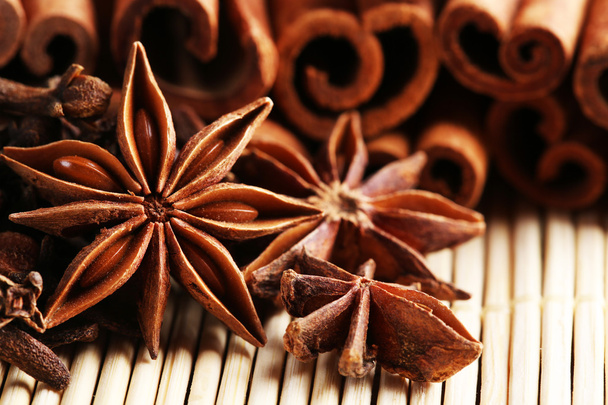 Carnation with cinnamon sticks - Fotoğraf, Görsel
