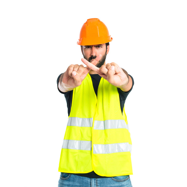 Workman doing NO gesture over white background - Zdjęcie, obraz