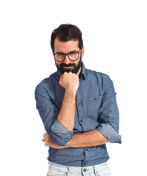 Young hipster man thinking over white background - Foto, immagini