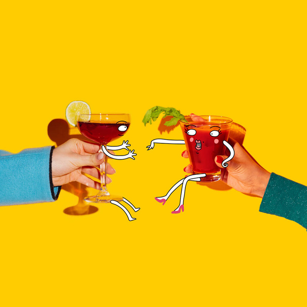 Contemporary art collage with drawings. Female hands holding glass with cocktails isolated on bright yellow background. Pop art, cartoon style - Photo, Image