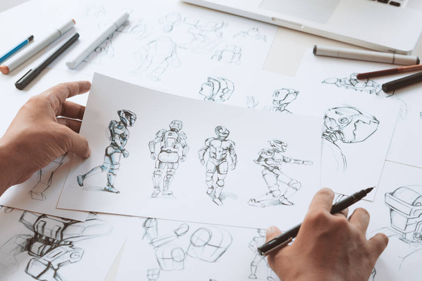 Animator designer Development designing drawing sketching development creating graphic pose characters sci-fi robot Cartoon illustration animation video game film production , animation design studio. - 写真・画像