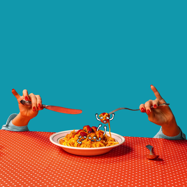 Food pop art photography. Female hands tasting spaghetti with meatballs on plaid tablecloth isolated on bright blue background. Cartoon, vintage, retro style interior - Φωτογραφία, εικόνα