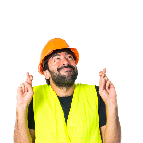 εργάτης με το ιστορικό πέρασμα λευκό δάχτυλα του - Φωτογραφία, εικόνα