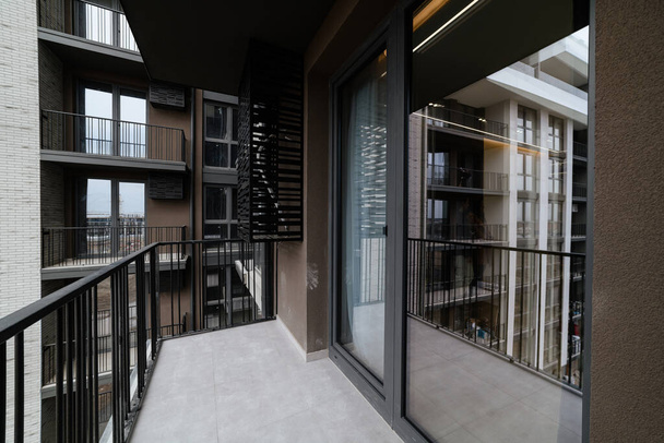large balcony with metal railings in the new house - Photo, Image