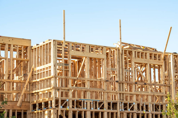 new frame condominium or apartment construction plywood lumber construction - Foto, immagini