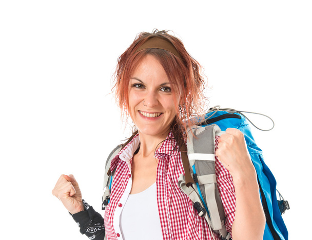 Lucky backpacker over isolated white background - Foto, immagini