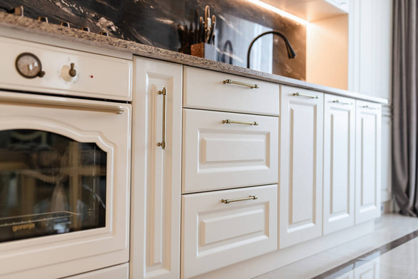 New modern kitchen with white facades - Фото, изображение