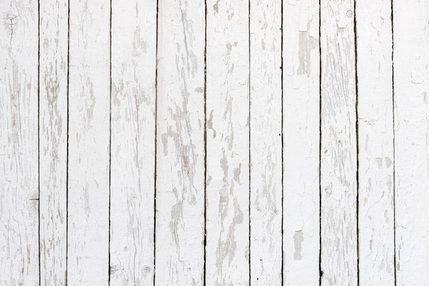 Background of weathered white planks, bright worn surface texture as graphic design element and copy space - Foto, Imagem