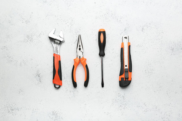 Set of various construction tools on a white background. Tools for home repair. Work at a construction site. top view. - Foto, Bild