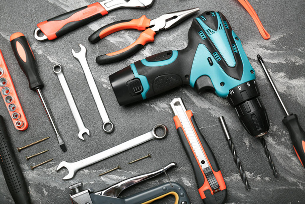 Set of various construction tools on a black background. Tools for home repair. Work at a construction site. - Photo, image