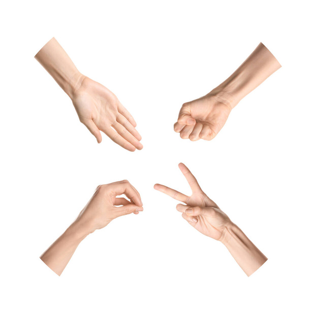 Руки, що показують різні літери на білому тлі. Алфавіт мови жестів
 - Фото, зображення