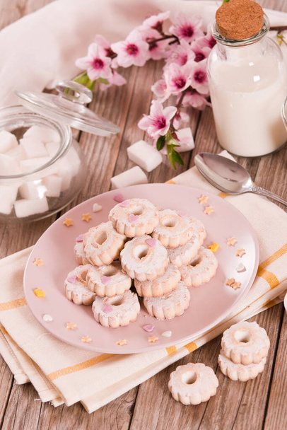 Canestrelli biscuits with sugars on wooden table. - Foto, immagini
