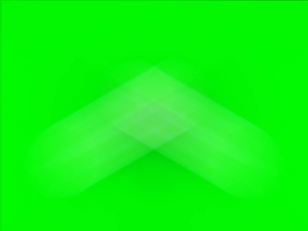 Blurred image, abstract green background and copy space, middle is arrowhead and rhombic parallelogram - Photo, image