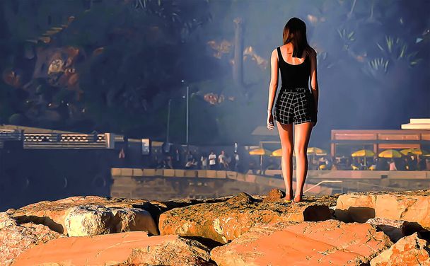 Die Silhouette eines Mädchens zwischen den Felsen auf der Klippe - Foto, Bild
