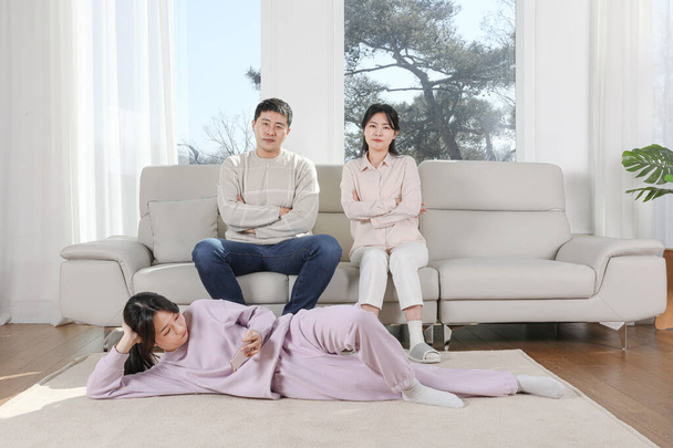 Asian Korean family. Photo of parents who are dissatisfied with their unemployed child - Photo, Image