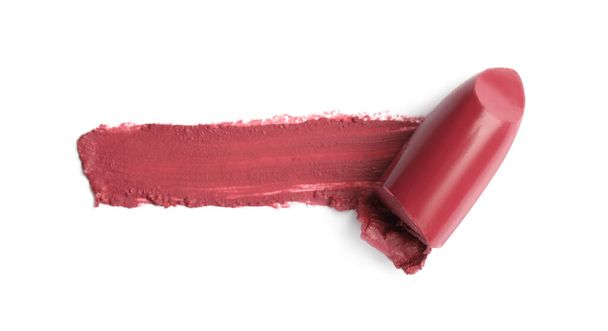 Lipstick and swatch on white background, top view - Фото, изображение