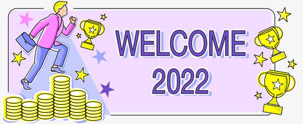 Hand writing sign Welcome 2022. Conceptual photo New Year Celebration Motivation to Start Cheers Congratulations Man climbing upwards money representing project success achieving goals. - Фото, изображение