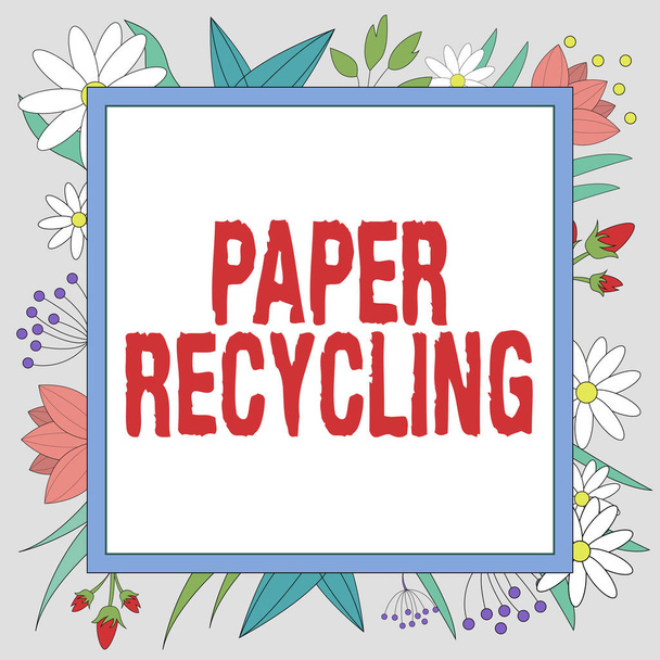 Exibição conceitual Reciclagem de papel. Abordagem de negócios Usando os papéis usados de uma nova maneira, reciclando-os Quadro decorado com flores coloridas e folhagem dispostos harmoniosamente. - Foto, Imagem