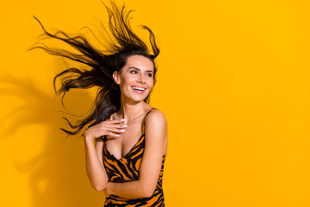 Photo of young cheerful lovely woman look empty space shampoo salon isolated over yellow color background - Фото, изображение