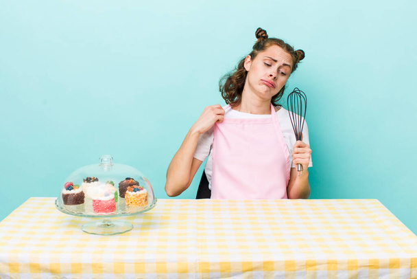 young pretty woman  feeling stressed, anxious, tired and frustrated. home made cakes concept - Fotoğraf, Görsel
