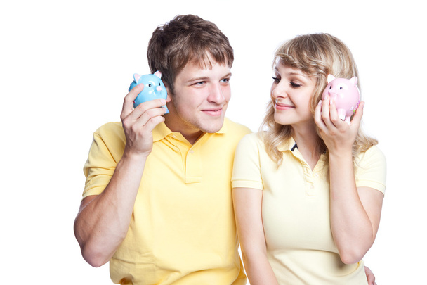 νεαρό ζευγάρι, εξοικονόμηση χρημάτων - Φωτογραφία, εικόνα