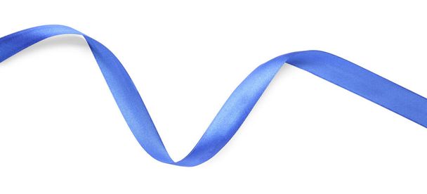 Beautiful blue ribbon isolated on white, top view - Zdjęcie, obraz