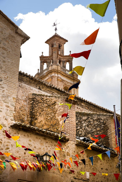 San Bartolome church with its beautiful tower bell decorated for the Gastronomic and Traditional Market of Finestrat - Photo, Image