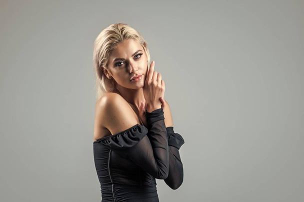 sexy girl with blond hair and stylish makeup and smooth skin, copy space, beauty - 写真・画像