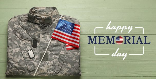 Uniform of soldier, USA flag and text HAPPY MEMORIAL DAY on wooden background - Photo, image