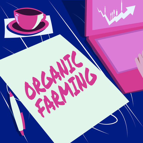 Text showing inspiration Organic Farming. Concept meaning an integrated farming system that strives for sustainability Laptop Resting Beside Coffee Mug And Plain Sheet Showing Work Process. - Fotografie, Obrázek