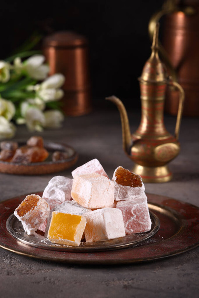 oriental sweets Turkish delight on a plate - Fotó, kép