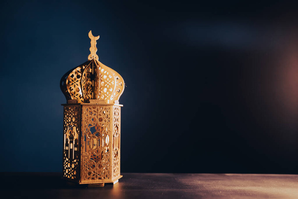 Ramadan Kareem background. Ornamental Arabic lantern glowing at night - Zdjęcie, obraz