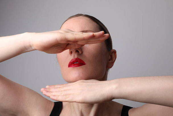 Mind set concept. Caucasian woman covering her face posing on white background. - Zdjęcie, obraz
