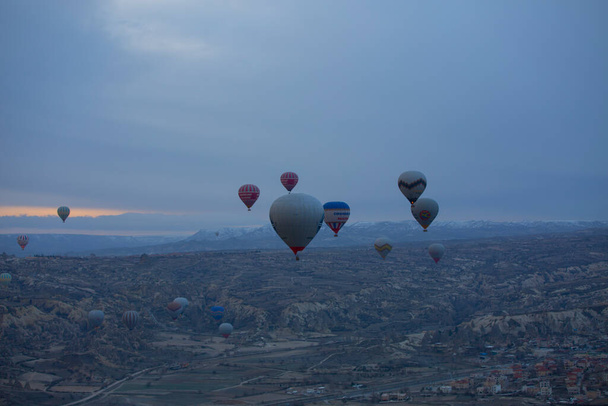 The great tourist attraction of Cappadocia - balloon flight. Cappadocia is known around the world as one of the best places to fly with hot air balloons. Goreme, Cappadocia, Turkey - Photo, image