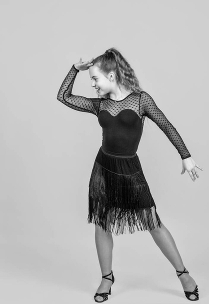 teenage girl straight ballroom dancer wear black dress in dance pose, dance - Valokuva, kuva