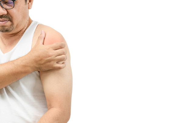 A middle aged man in white veat suffering from arm and shoulder pain isolated on white. Office syndrome or Frozen shoulder. Health care and medical concept. - Foto, imagen