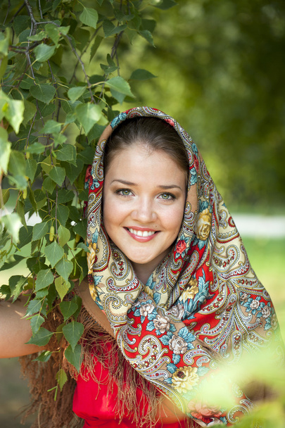 Beauty woman in the national patterned scarf - Fotografie, Obrázek