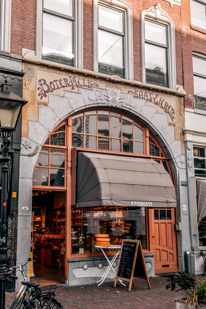 Amsterdam, Netherlands - October 8, 2021: Exterior of a traditional cheese store in Rotterdam, the Netherlands. - Fotó, kép