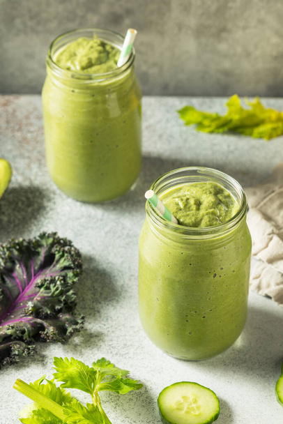 Healthy Organic Detox Green Smoothie with Kale Spinach and Cucumbers - 写真・画像