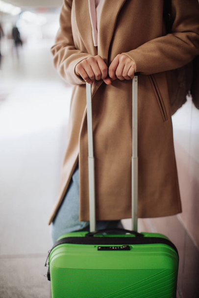Woman traveler tourist waiting with luggage at train station, cut out. - Valokuva, kuva