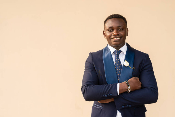 Portrait of handsome young African man wearing suit - Photo, Image