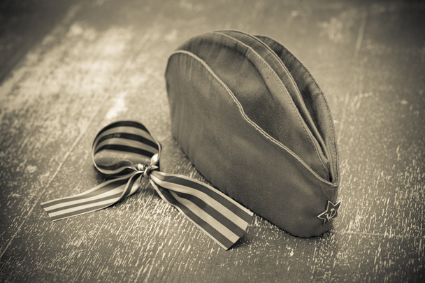 Victory Day on May 9. Garrison cap and George Ribbon. retro style - Photo, Image