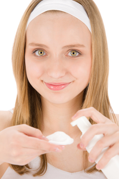 Acne facial care teenager woman apply cream - Foto, Bild