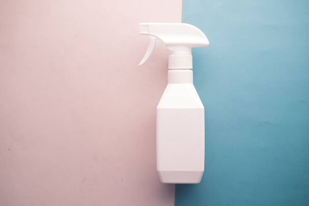  top view of white color spray bottle on color background  - Photo, Image