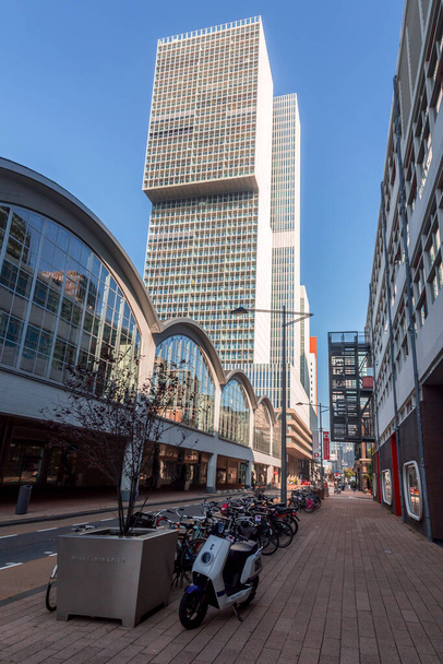 Rotterdam, the Netherlands - October 8, 2021: Street view and modern architecture with business towers in downtown Rotterdam. Rotterdam is the second largest city of the Netherlands. - Fotografie, Obrázek