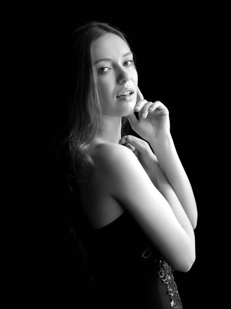 Portrait of beautiful sexy girl on a black background - Фото, изображение