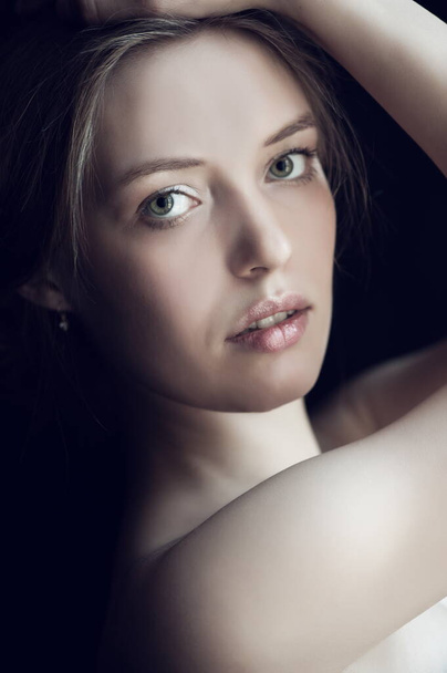 Portrait of beautiful sexy girl on a black background - Fotoğraf, Görsel