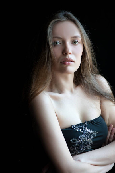 Portrait of beautiful sexy girl on a black background - Foto, immagini