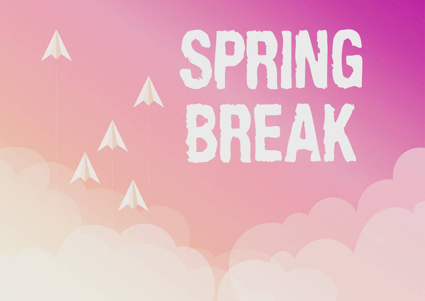 Text sign showing Spring Break. Word for Vacation period at school and universities during spring Five paper airplanes flying up sky surrounded with clouds achieving goals. - Фото, изображение